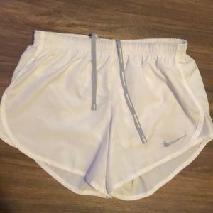 white nike dri-fit athletic shorts